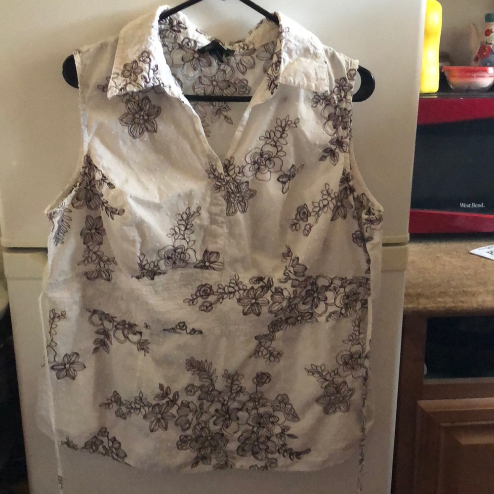 White blouse with brown flower design